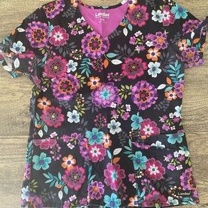 Gently uses scrub top in size small